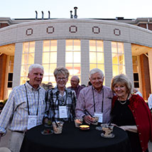 Four people smiling. Links to Gifts from Retirement Plans